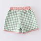 Green plaid boy swim trunks