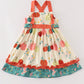 Platinum pumpkin print ruffle apron dress