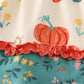 Platinum pumpkin print ruffle apron dress