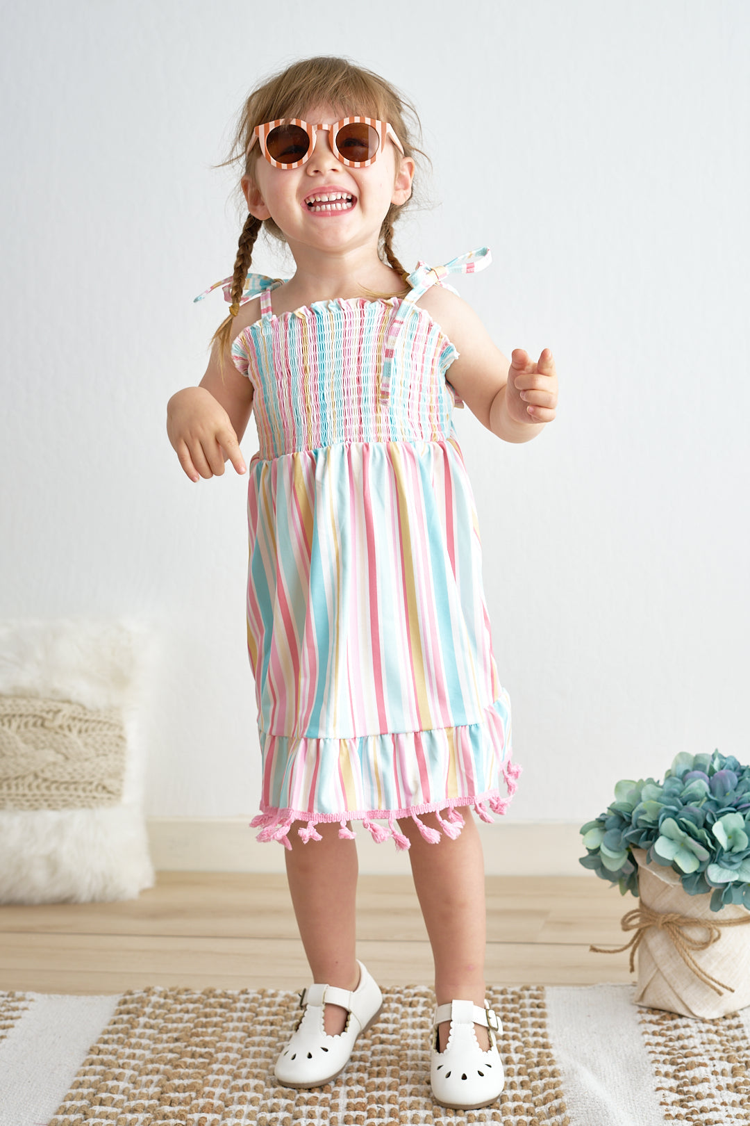 Pink stripe smocked strap dress