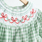 Green bow tie hand smocked gingham dress