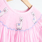 Pink alpaca hand smocked gingham dress