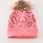 Pink pompom leopard cable beanie