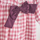 Pink gingham flannel bow dress