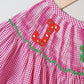 Pink christmas joy hand smocked gingham dress