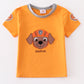 Orange character applique boy top