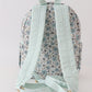 Green floral ruffle backpack