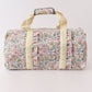 Yellow floral travel bag