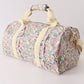 Yellow floral travel bag