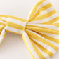 Gold piggie hair bow