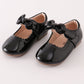 Black bow mary jane shoes