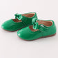 Green bow mary jane shoes